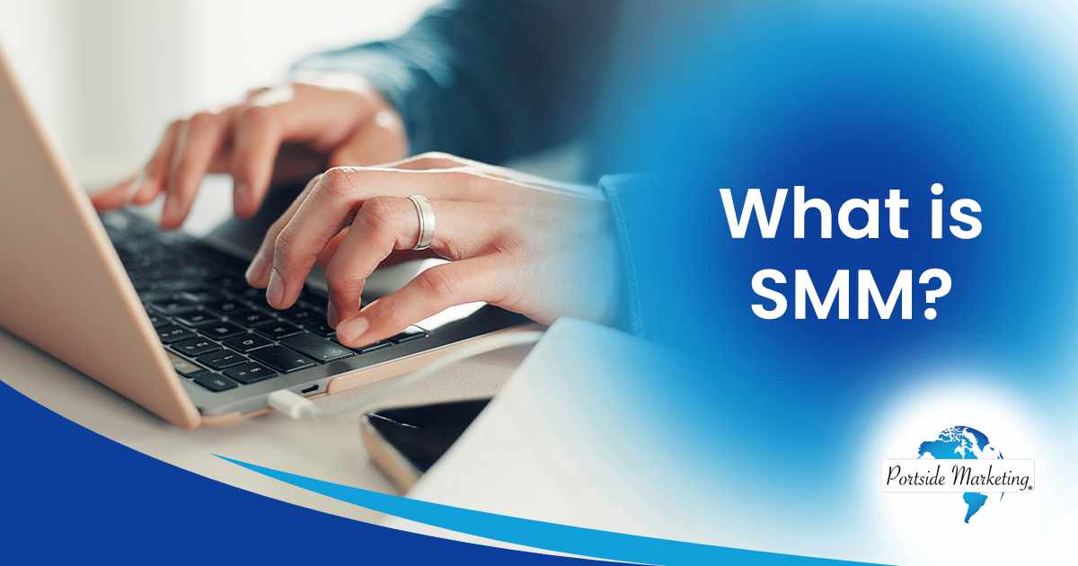 Man typing on a laptop in a creative agency office, working on research and content planning for a social media campaign. Featuring Portside Marketing and supporting the topic ‘What is SMM?’ within the page’s context.